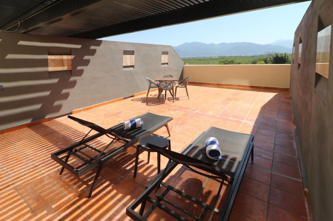 Habitación Estándar con 2 camas grandes y terraza